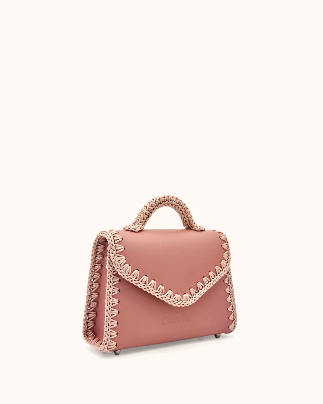 Bolso pequeño tipo satchel Sofía S en color rosa, artesanal, de cuero con crochet hecho a mano por Cueché